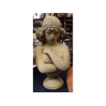 Composition bust of a young lady with folded arms, raised on circular socle, 16ins high