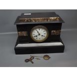 Black slate and marble fronted mantel clock, with enamelled Arabic chapter ring, together with key