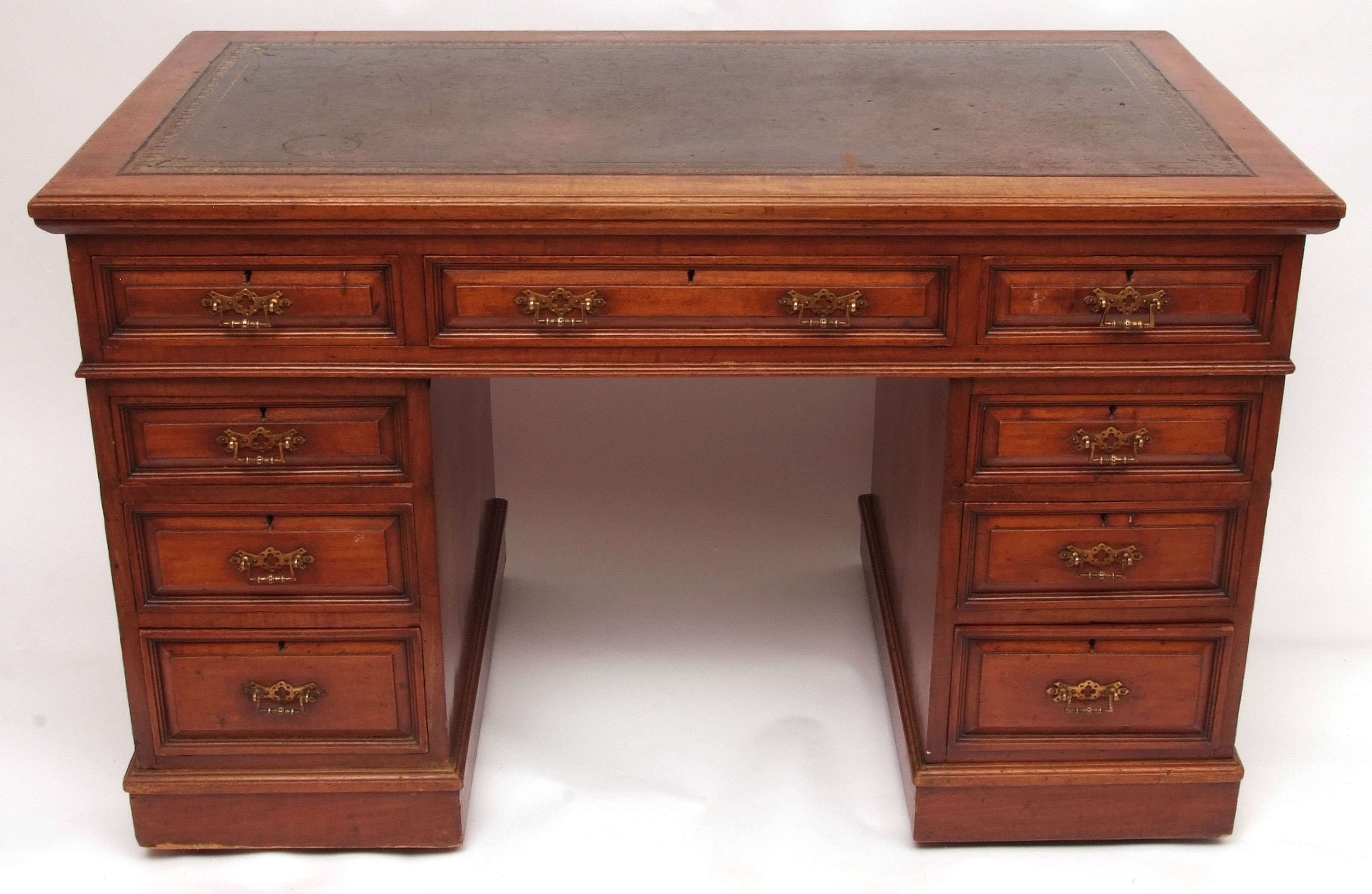 Late Victorian Mahogany nine-drawer, twin pedestal Writing Desk, the moulded-fronted drawers with