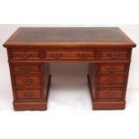 Late Victorian Mahogany nine-drawer, twin pedestal Writing Desk, the moulded-fronted drawers with