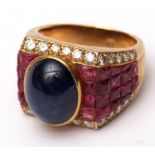 Gent s designer made dress ring featuring an oval cabochon sapphire measuring 12mm x 10mm, multi-