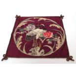 Early 20th century silk work panel in Oriental style of bird amongst trailing flowers and foliage to