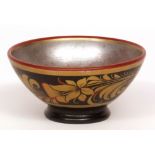 Small Russian circular papier mbchi bowl with gilt floral and foliate decoration, worn silvered