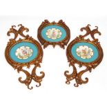 Set of three mid-19th century French circular porcelain plaques, each painted to the centre with a