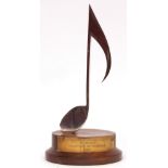 A polished Silver plated and wooden based award to Sir Malcolm Arnold Wavendon Allmusic Awards