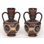 Pair of late 19th/early 20th century Doulton Lambeth stoneware baluster vases with white, blue and