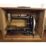 Pine boxed cast metal So-All sewing machine with painted floral detail,14 1/2 ins x 10ins