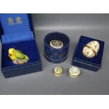 Three Halcyon Days pill boxes,one modelled as a bird,an enamelled Bilston & Battersea enamelled