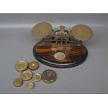Brass set of postal scales and weights
