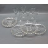 Set of five pressed glass plates with open work designed outer border,6 1/2 ins diameter,together