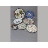 Group of six Oriental plates in various sizes and designs,together with a further late 20th