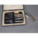 Leather cased part silver handled manicure set to include ivory handled button hooks etc (qty)