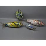 Group of four 20th century Murano glass fish,to include a leaping fish,all with a multi-coloured