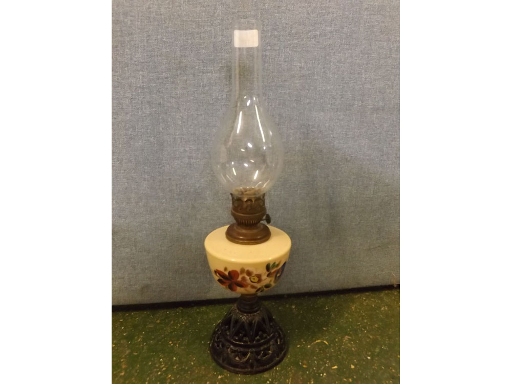 Victorian oil lamp, with painted cream font with flowers, raised on a pierced cast stand, together