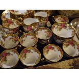 Part set of Royal Chelsea Golden Rose tea wares, comprising 10 cups, 12 saucers and side plates, 2