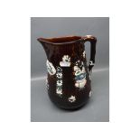 Barge-ware brown glazed jug with raised floral relief and plaque with Albert Musk Peace & Plenty