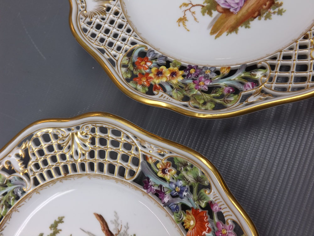 Pair of 19th century Meissen plates with painted figure centres, open work edge, painted floral - Image 7 of 7
