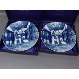 Two boxed Meissen blue and white collectors plates of winter scenes, dated to reverse 1975, 10ins