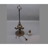 Bronze tri-formed oil lamp, with three burners and turned column on a shaped octagonal base with top