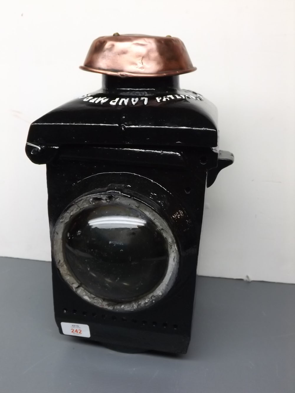 Vintage black painted railway lamp with bull's eye glass, for MFO & ALY Supplies Ltd with pressed