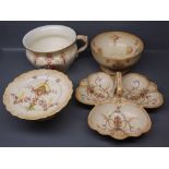 Four pieces of Crown Devon wares to include a clover formed three-bowl hors d'oeuvres dish, pedestal