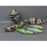 Group of six 20th century Murano glass fish of varying styles, to include one leaping fish, raised