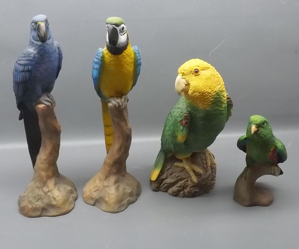 Three models of exotic birds, to include Macaw by North Light; plus model by Animal Classics,