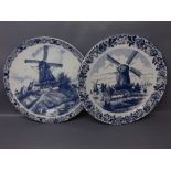 Pair of modern Delft blue and white Dutch chargers of printed windmill scenes, 15ins diameter (2)