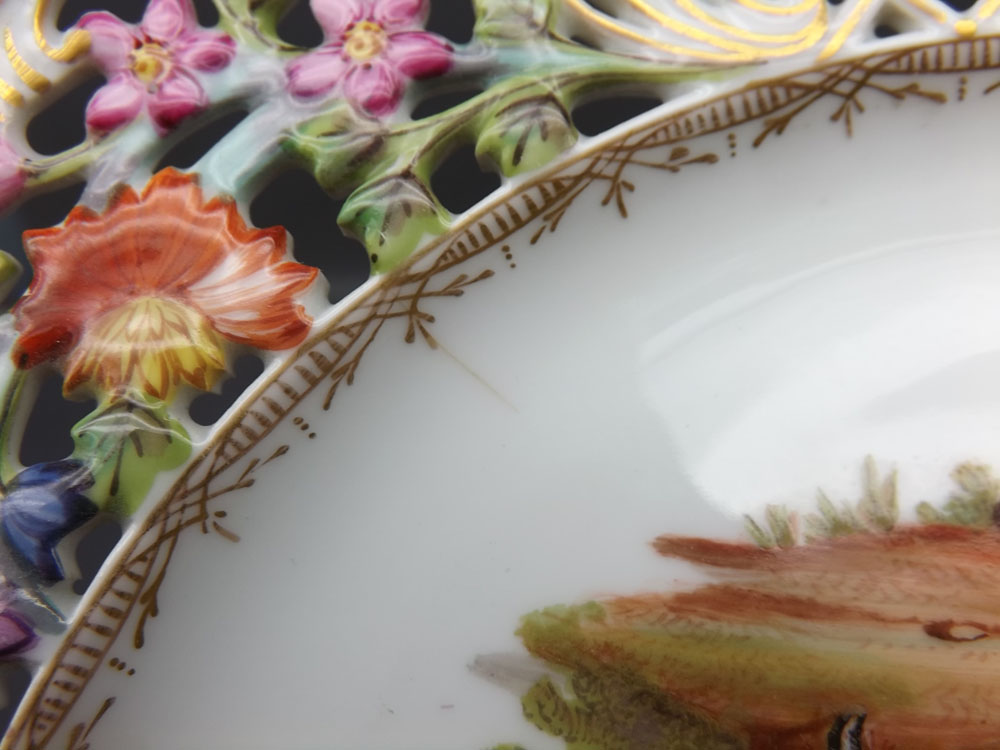 Pair of 19th century Meissen plates with painted figure centres, open work edge, painted floral - Image 3 of 7