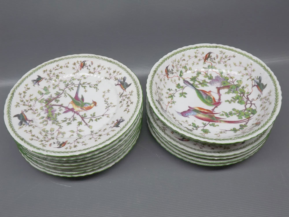 Set of early 20th century Continental porcelain dessert wares, featuring exotic birds amongst