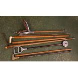 Collection of walking canes including a Victorian Malacca walking cane with engraved white metal