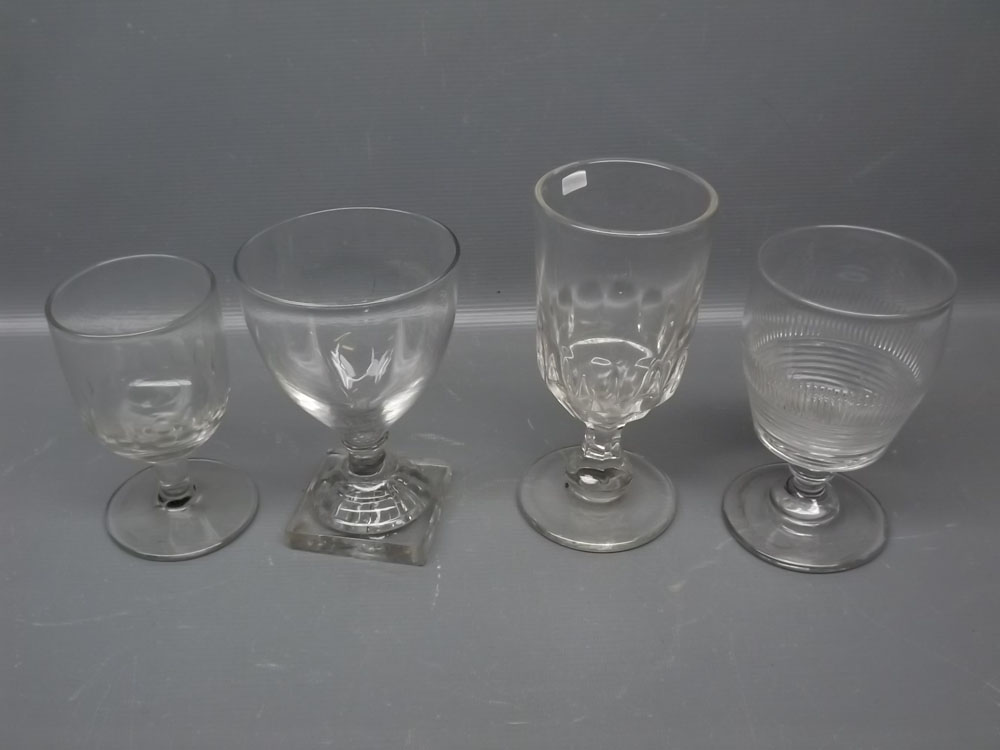 Four various 20th century clear glass rummers, of varying sizes, largest 6 1/2 ins