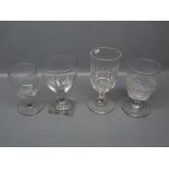 Four various 20th century clear glass rummers, of varying sizes, largest 6 1/2 ins