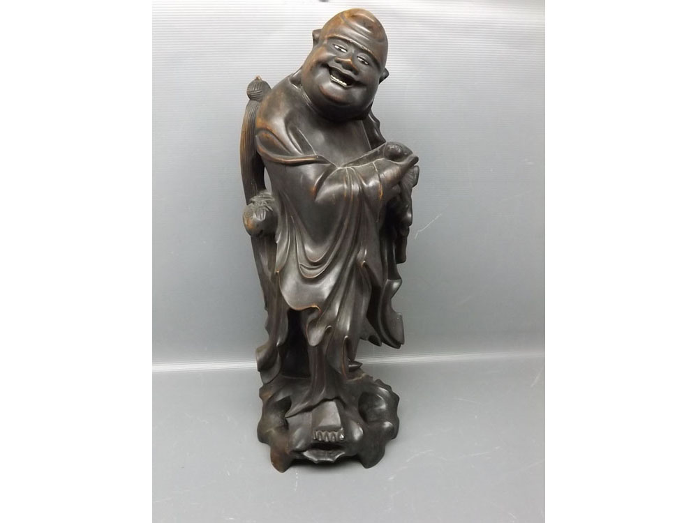 Early 20th century root carved figure of a Buddha, with carved detail and openwork stand, with