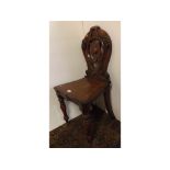 Victorian mahogany hall chair with pierced shield back on front turned legs (A/F)