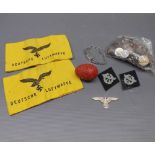 Box: quantity of mixed coinage, red carved floral encrusted egg, reproduction Luftwaffe arm bands