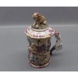 Capodimonte lidded tankard with raised battle scene of soldiers on horseback with lions, with shaped