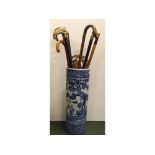 Late 19th/early 20th century Imari blue and white stick stand holding nine assorted walking canes/