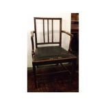 Early 19th century mahogany armchair with three square reeded rail back with black rexine drop in