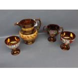 Near pair of lustre goblets with painted decoration, together with a two-handled loving style cup