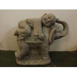 Composition model of an elephant with raised trunk, together with a laying young Buddha to top,