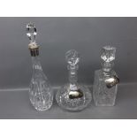 Mixed lot of three various clear glass decanters: square formed decanter with matching stopper and