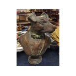 Composition bronzed bust of suited dog with bow tie, raised on circular column, 16ins tall