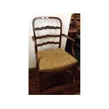 Georgian mahogany armchair with laddered back and shaped arms with floral and cream upholstered seat