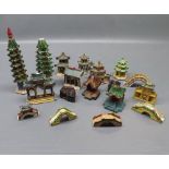 Large quantity of miniature pagoda topped buildings with bridges etc (qty)