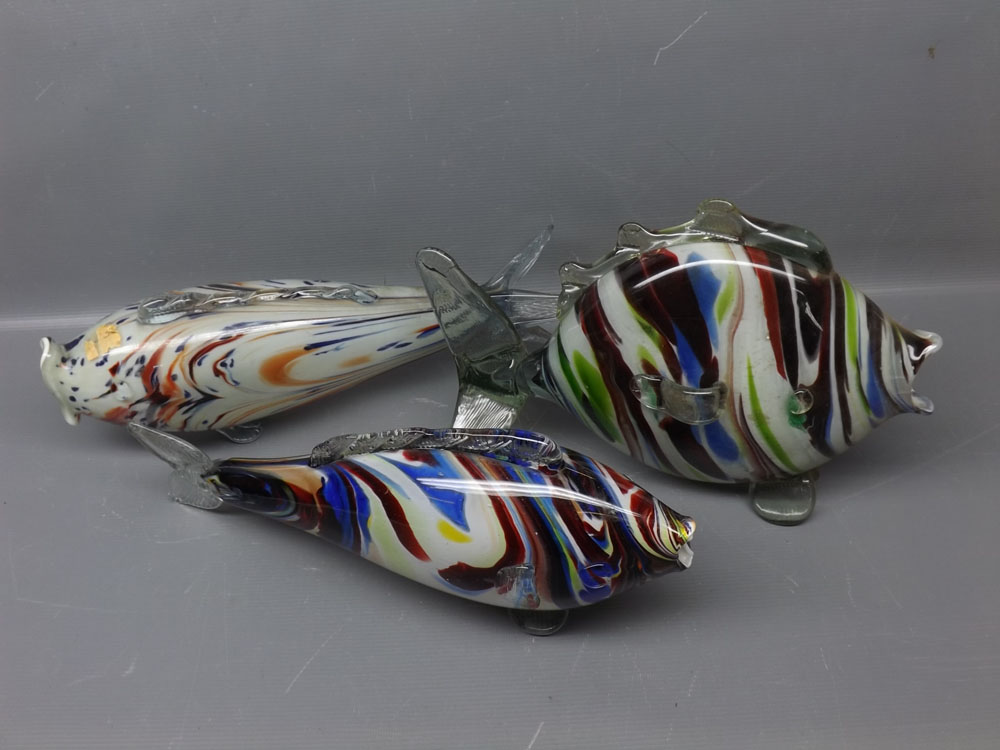 Three 20th century Murano multi-coloured glass fish, of varying sizes, largest 30ins long