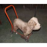 Vintage Straw-filled Ride-One Child's Dog, made by Lines Bros of Ireland Ltd, with red tubular frame