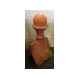 Composition terracotta coloured ridge tile, with ball finial and fluted decoration, 11 x 21ins