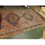 Early 20th century Caucasian carpet with floral geometric designs with three central diamond