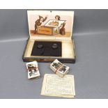 Boxed Camerascope Stereo Viewer with a large quantity of army club cigarette cards and a series of